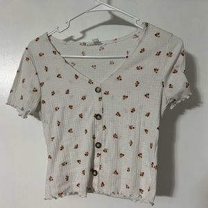 2 Caution To The Wind Cropped T-Shirts.